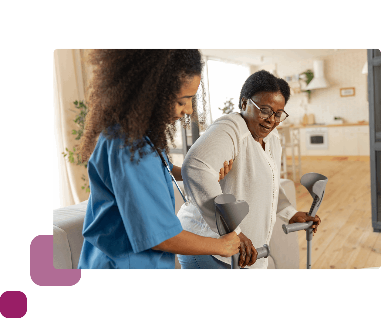 Nurse helping lady with her crutches