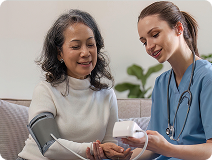 Nurse-checking-womens-blood-pressure